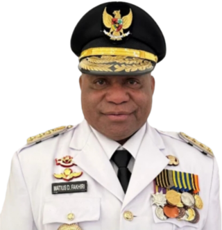 Mathius Fakhiri, Idul Fitri Papua, pengawasan harga bahan pokok, kepala daerah Papua, stabilitas harga sembako, inflasi Papua, distribusi bahan pokok Papua