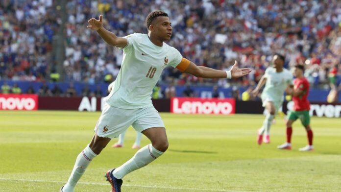 kylian-mbappe-1783633316873_169 Kylian Mbappe kembali memimpin daftar top skor Piala Dunia 2026 setelah mencetak gol ke gawang Maroko. Meski sama-sama mengoleksi delapan gol dengan Lionel Messi, Mbappe unggul dalam jumlah assist.